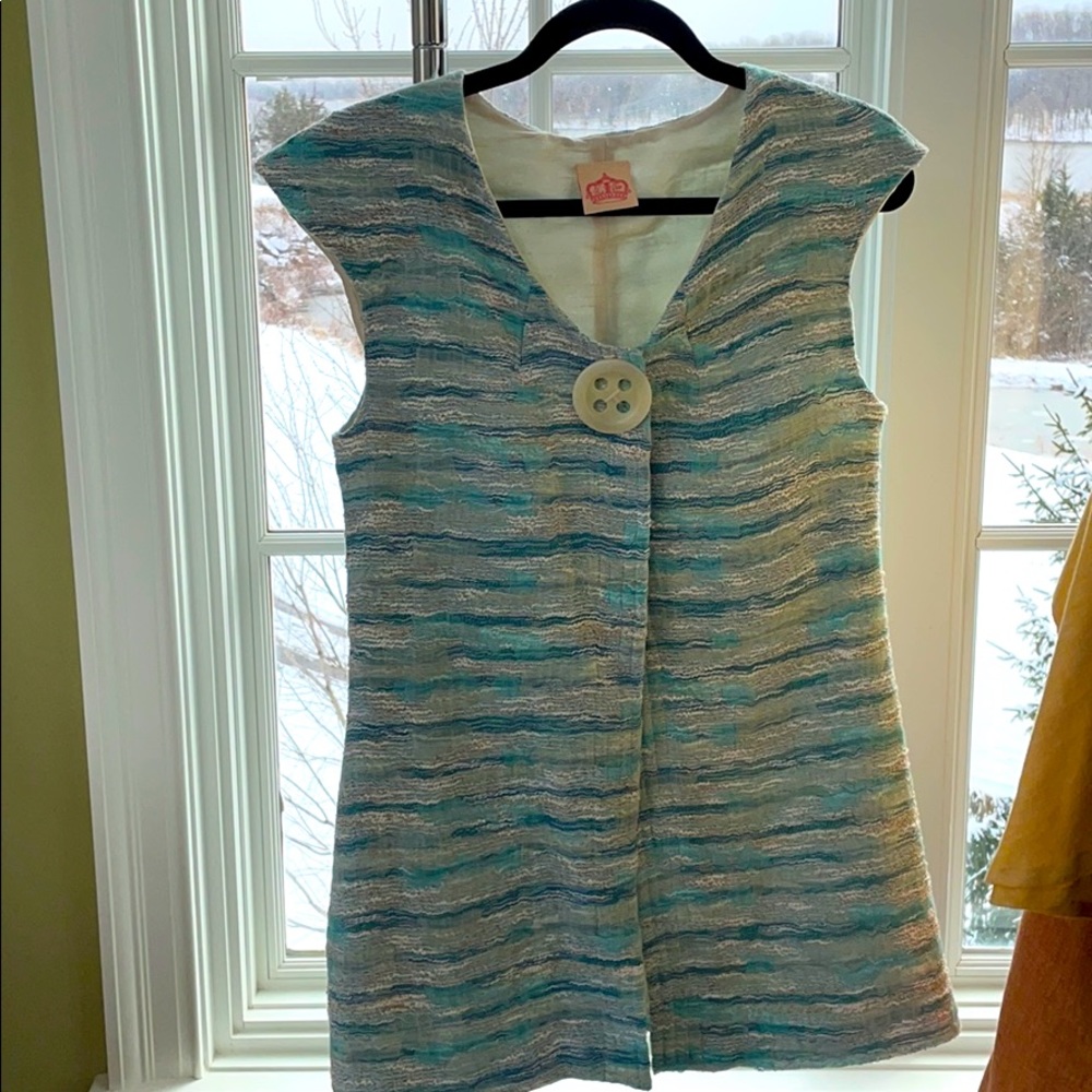 Designer sleeveless jacket!  Imported fabric!